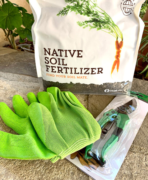 fertilizer, garden gloves and sheers